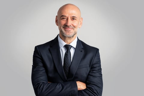 Portrait of caucasian business man looking at camera and smiling