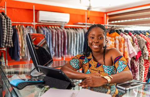 African woman, successful small business SME owner of a clothing boutique